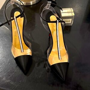 Christian Louboutin Satin And Pvc . Brand new . Comes with box and shoe bags